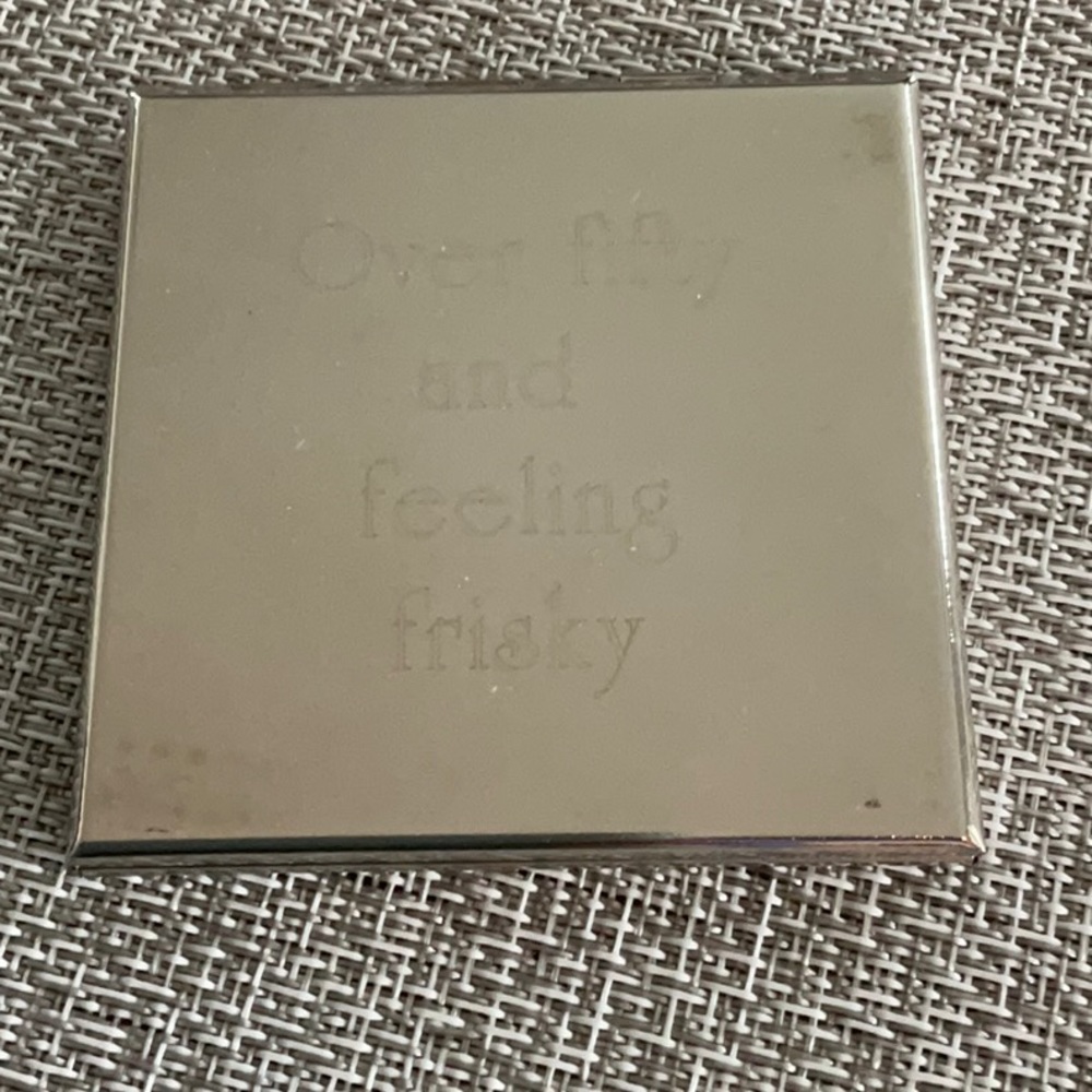 Shiny mirror compact.